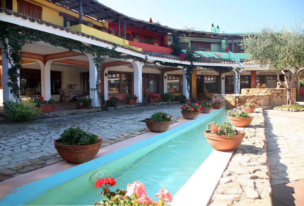 Hotel Residence Rena Bianca Baja Sardinia Exterior photo